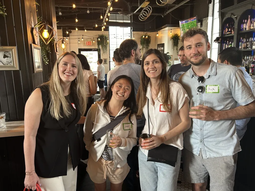 Quickhubly team members at a bar gathering